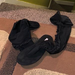 Thigh high black sandals